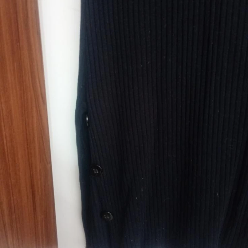 Blusa longa colada com botões na lateral