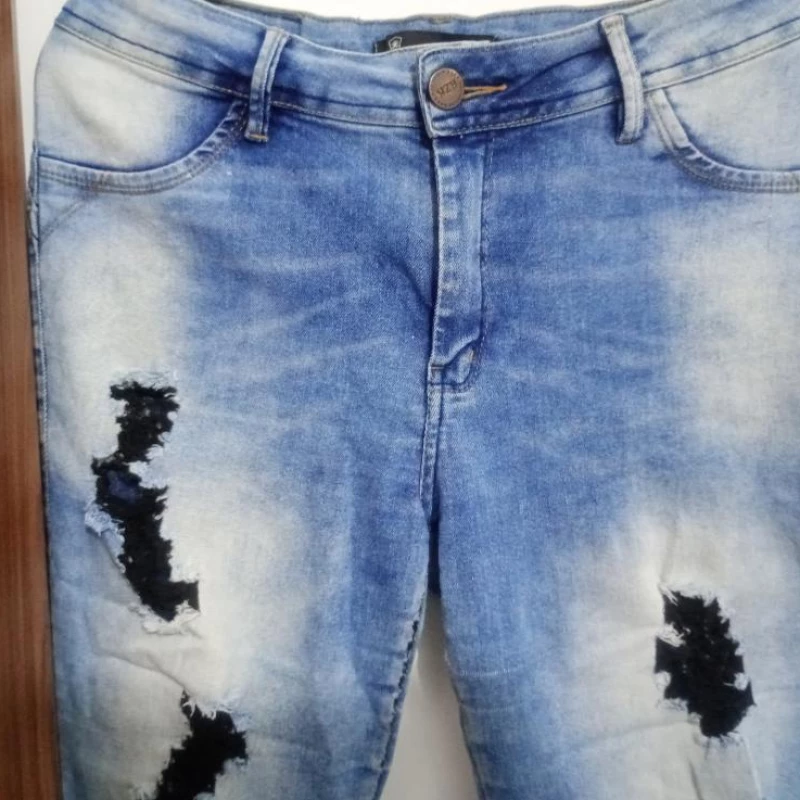 Linda calça rzk tamanho 42 estilosa,