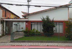 Foto Casa com 3 dormitórios à venda, 150 m² por R$ 2.000.000 - Centro - Pindamonhangaba/SP