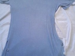 Blusa longa colada com botões na lateral